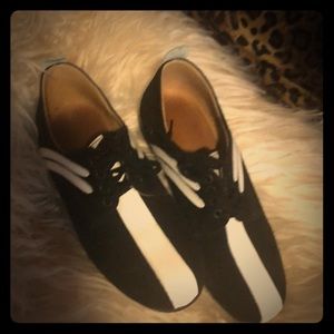 Black and white suede bowling shoes